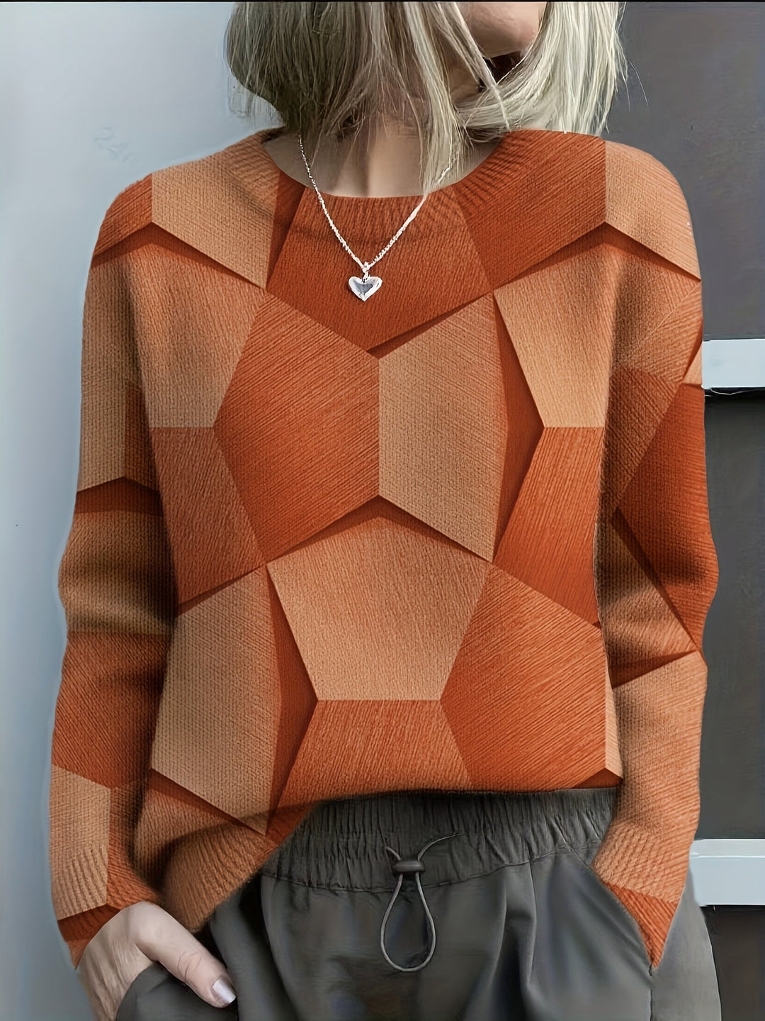 LUCIA – GEOMETRISK FARVEBLOKSTRIKKET SWEATER — 1